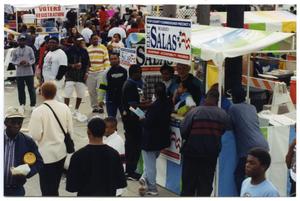 Primary view of object titled '[Mario Salas Booth During Martin Luther King March]'.