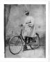 Thumbnail image of item number 1 in: '[Caroline McGuire Street, posing on a bicycle]'.