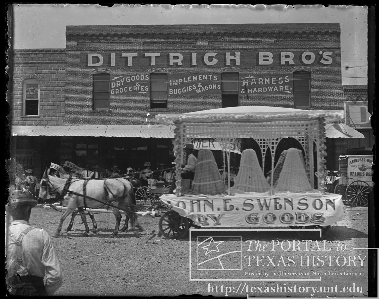 Parade Float: John E. Swenson, Dry Goods
                                                
                                                    [Sequence #]: 1 of 1
                                                