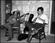 Photograph: [Jim Fox and Charles Davis Playing Music at Frontier Fort]