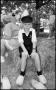Photograph: [Boy Wearing Wooden Shoes]