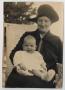 Photograph: [Nannie Sleeper Evans Holding a Baby]
