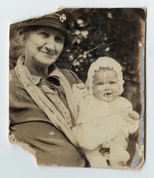 Primary view of [Nannie Sleeper Evans Holding a Baby]