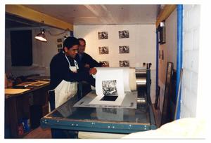Primary view of object titled '[Two Men Silkscreen Printing]'.