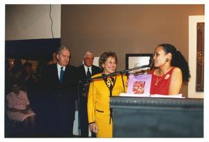 Primary view of object titled '[Sylvia Orozco Presenting a Certificate]'.