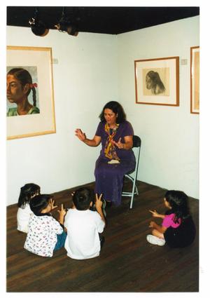 Primary view of object titled '[Docent Speaking to Small Group of Children]'.
