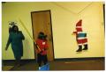 Primary view of [Boy with Beating Stick During Christmas Party]