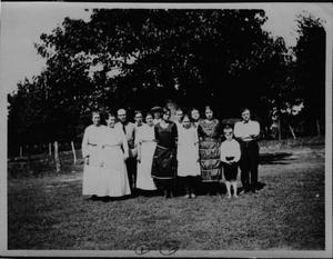 Primary view of object titled '[Falls Reunion Portrait, Family in Field]'.