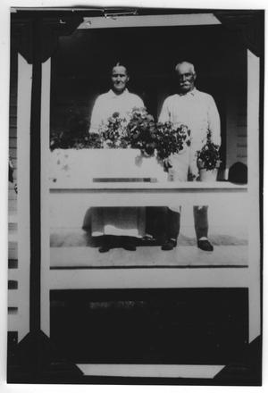 Primary view of object titled '[Sarah Elizabeth Johnson Falls and Soloman Falls on Porch]'.