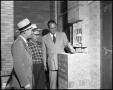 Thumbnail image of item number 1 in: '[Men examining brickwork at St. Paul's Lutheran School]'.