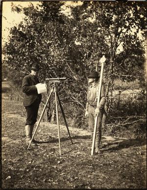 Primary view of object titled 'Railroad Survey Crew Members Pose with Surveying Tools, c. 1902'.