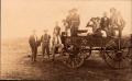 Thumbnail image of item number 1 in: 'Railroad Survey Crew Poses on a Wagon, c. 1902'.