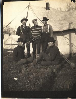 Primary view of object titled 'Railroad Survey Crew Members Pose by Tents, c. 1902'.