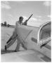 Primary view of [Man turning propeller]