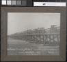 Photograph: [Childress Tradegetters Stand on the Red River Bridge]