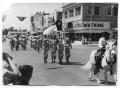Thumbnail image of item number 1 in: '[Colonel Sam Privitt on Caesar with Military Color Guard and Band]'.