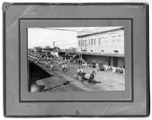 Primary view of object titled '[B.P.O.E. (Elks) Members Marching in Parade]'.