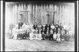 Primary view of object titled '[Children Outside Building]'.