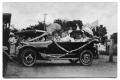 Thumbnail image of item number 1 in: '1919 Type 57 Cadillac seated with members of the Scrivner family'.