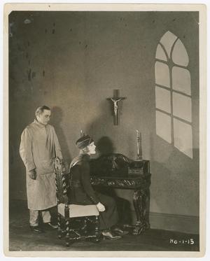Primary view of object titled '[Man and woman on set]'.