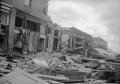 Photograph: [Photograph of Two Men and Debris After Tornado]