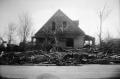 Primary view of [Photograph of House and Debris After Tornado]