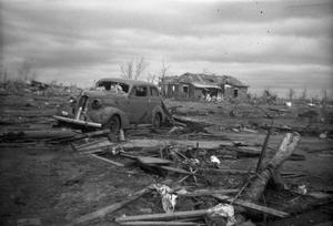 Primary view of object titled 'Car and House After Tornado'.