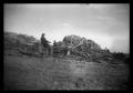Thumbnail image of item number 1 in: '[Photograph of Man and Pile of Debris]'.