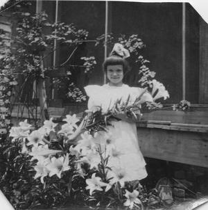 Primary view of object titled '[Katherine Elizabeth Griggs with Easter Lilies]'.