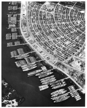 Primary view of object titled '[Aerial View of the Mothball Fleet in Orange, Texas]'.