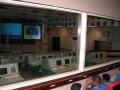 Photograph: [Kids Looking into Mission Control Room]