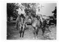 Photograph: [Johnny and Moise Ratcliff on Horseback]