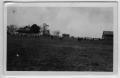 Primary view of [Sheep grazing near farm house and barn]