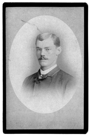 Primary view of object titled '[Oval photograph of unknown man with moustache]'.
