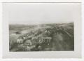 Photograph: [Photograph of Houses Along a Road]