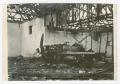 Photograph: [Photograph of a Damaged Airplane in a Ruin]