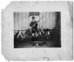 Photograph: [L.E Chapman posed with his quarry]