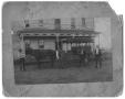Photograph: [Men and Carriage in Front of Hotel]