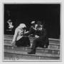 Photograph: [Couple Playing Cards on a Porch]
