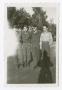 Photograph: [Four Soldiers In Front of Trees]