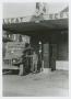 Photograph: [Soldier at Hellcat Service Station]