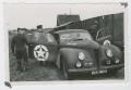 Photograph: [Officers by Car]