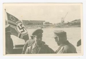 Primary view of object titled '[German Soldiers with a Nazi Flag]'.