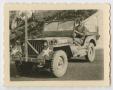 Photograph: [119th Engineer Battalion Jeep]