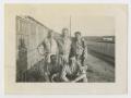 Thumbnail image of item number 1 in: '[Five Soldiers Posing by Hutment]'.