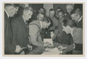 Primary view of object titled '[Hitler Signing a Book]'.