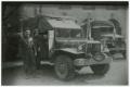 Photograph: [Carrol Starkey, Harry Barker, and Gus Mellas with Dodge Truck]