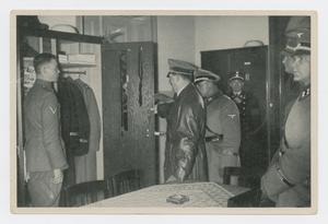 Primary view of object titled '[Hitler Inspecting a Locker]'.