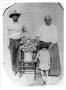 Thumbnail image of item number 1 in: 'Anastacio and Luisa Flores Chavaria with Manuel Nunez'.