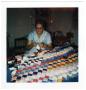 Photograph: Angelita M. Campos Working on a Quilt